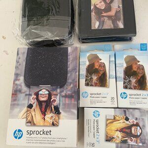 HP Sprocket, 3 boxes of film and two photo albums, unopened